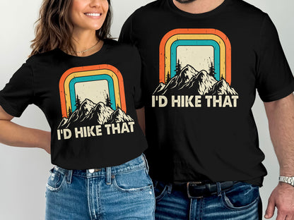 Two people wearing matching t-shirts with "I'd Hike That" and mountain graphic.