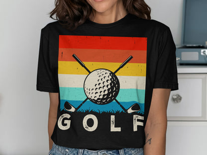 Black t-shirt with crossed golf clubs and ball graphic on striped background.