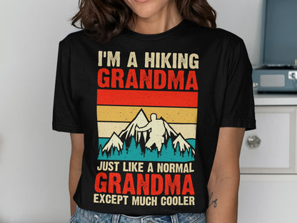 Black t-shirt with "I'm a hiking grandma just like a normal grandma except much cooler" text.