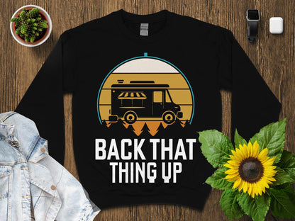 Black sweatshirt with vintage food truck graphic and "Back That Thing Up" text.