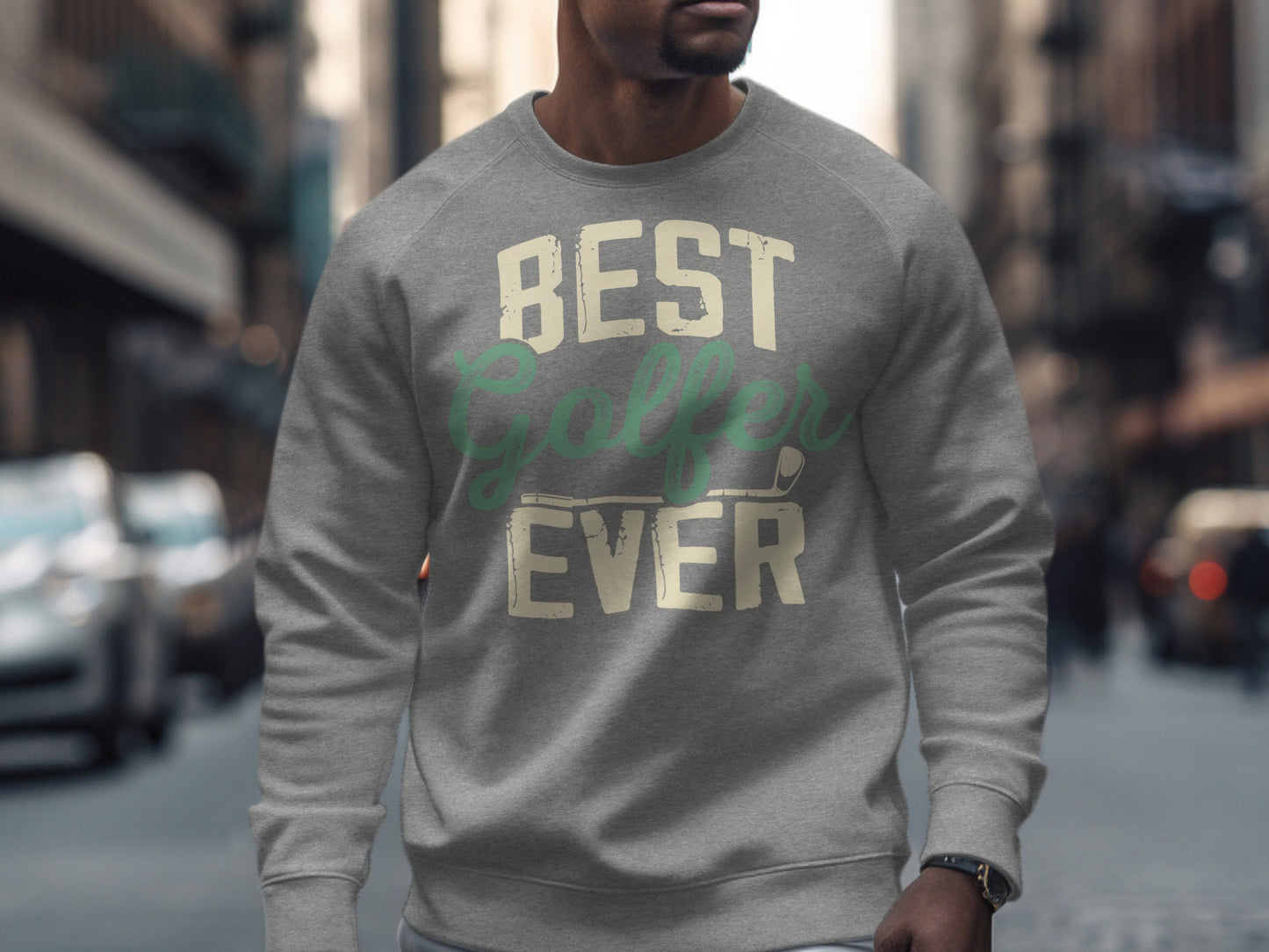Gray sweatshirt with "BEST GOLFER EVER" text across the chest.