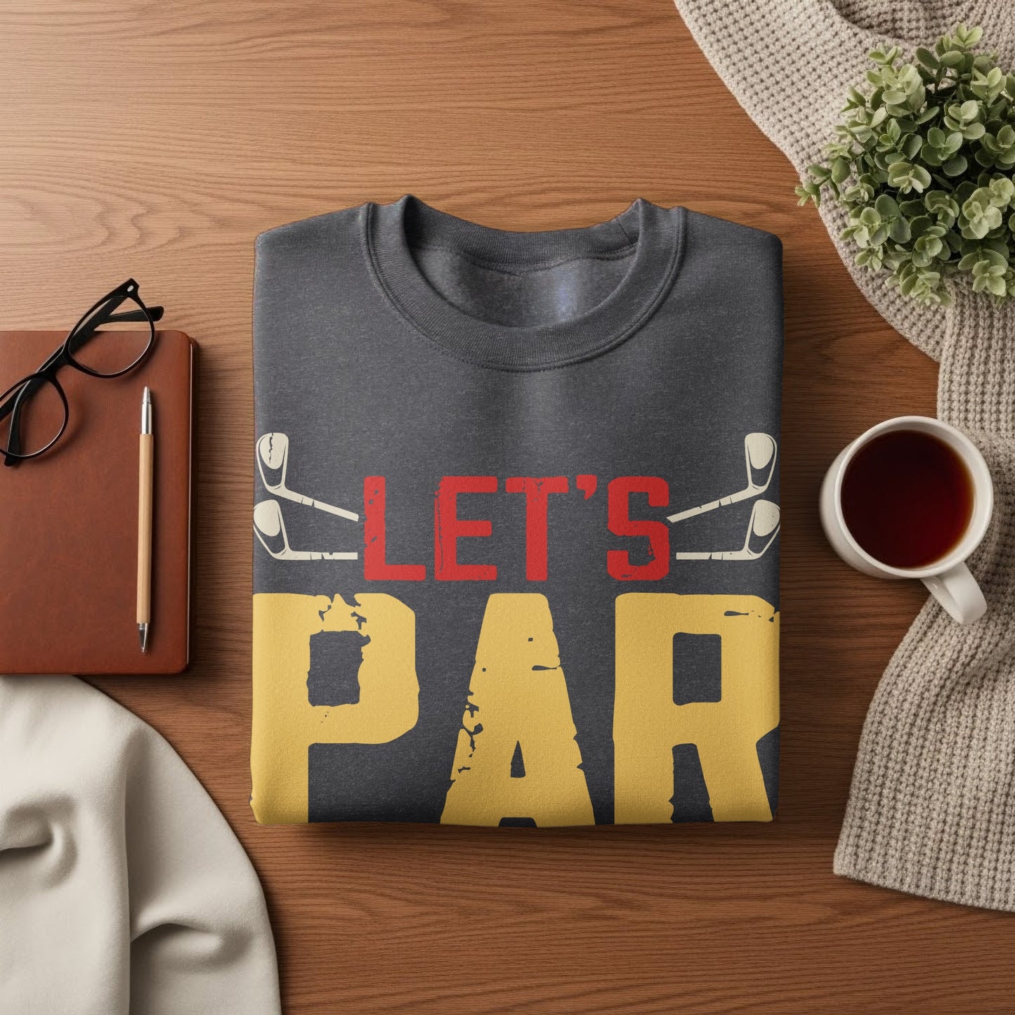 Dark gray sweatshirt with "LET'S PAR" text and golf club graphics.