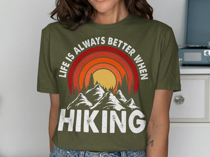 Green t-shirt with "Life is Always Better When Hiking" and mountain sunset graphic.