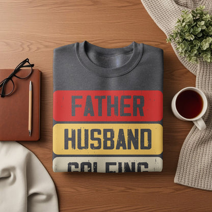 Dark gray sweatshirt with "FATHER HUSBAND" and "KING" text.