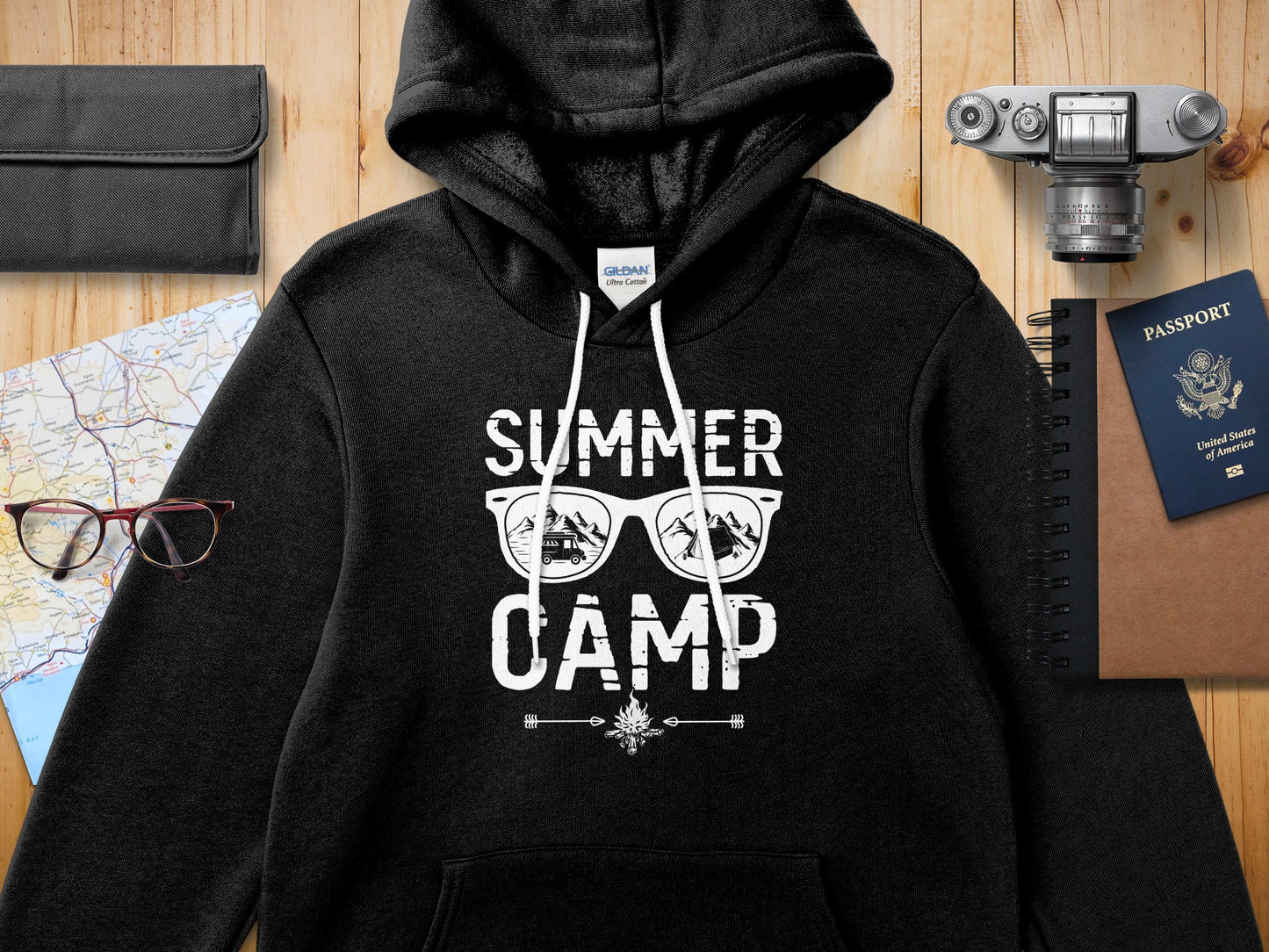 Black hoodie with "SUMMER CAMP" text and sunglasses graphic.