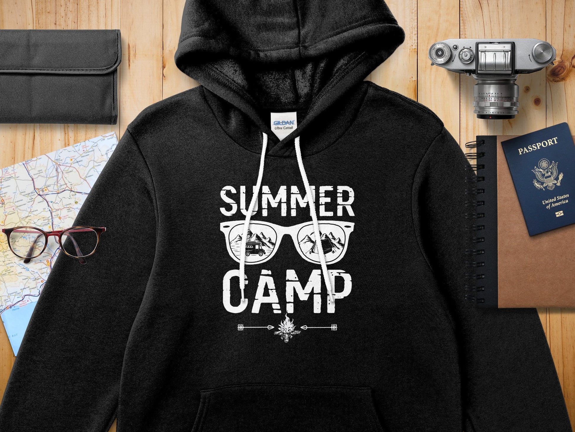 Black hoodie with "SUMMER CAMP" text and sunglasses graphic.