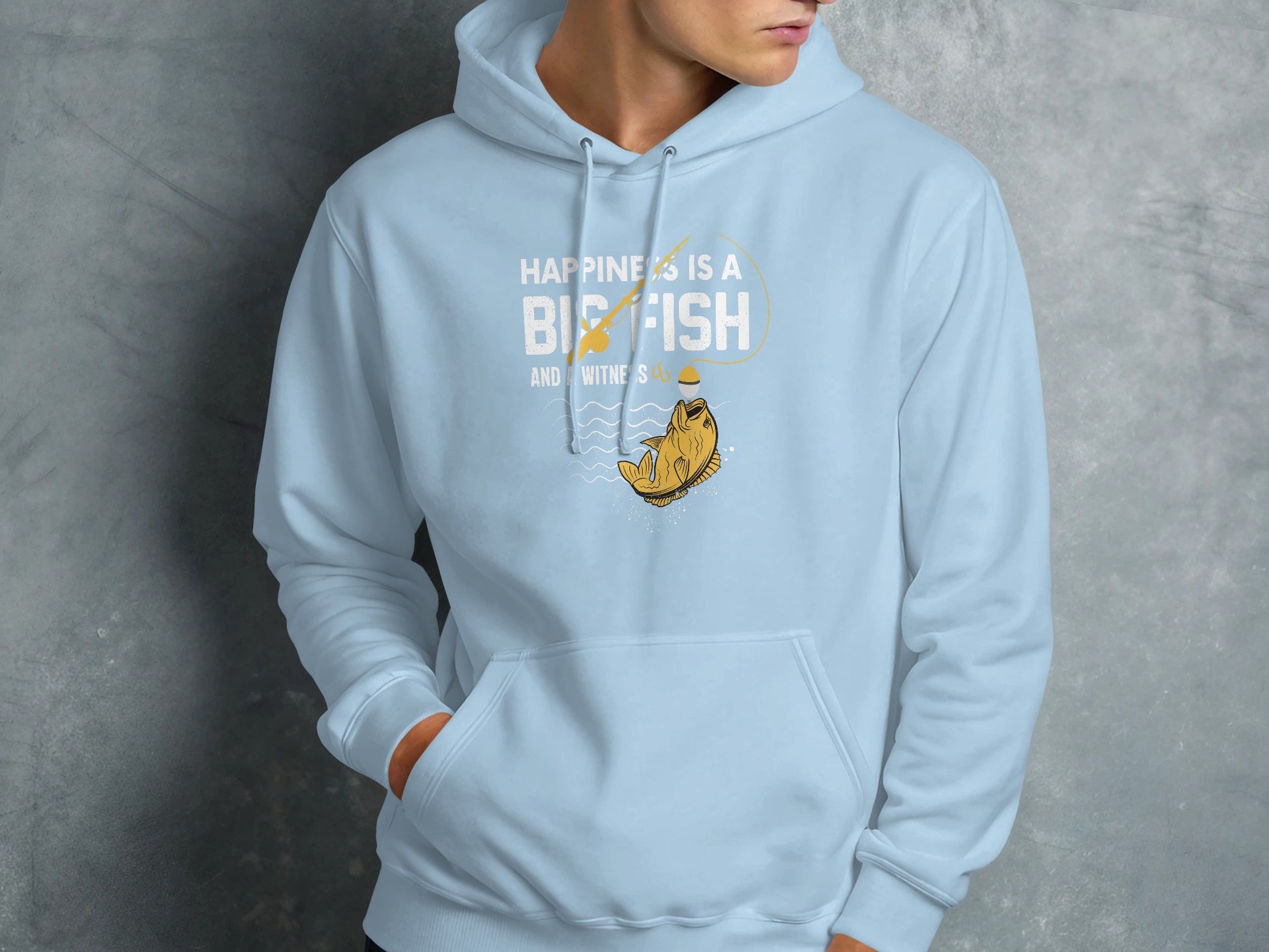 Light blue hoodie with graphic of a fish jumping and text "Happiness is a big fish".