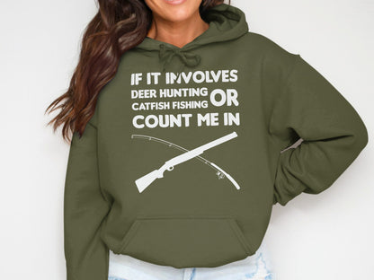 Green hoodie with "If it involves deer hunting or catfish fishing count me in" text and crossed rifle and fishing rod.
