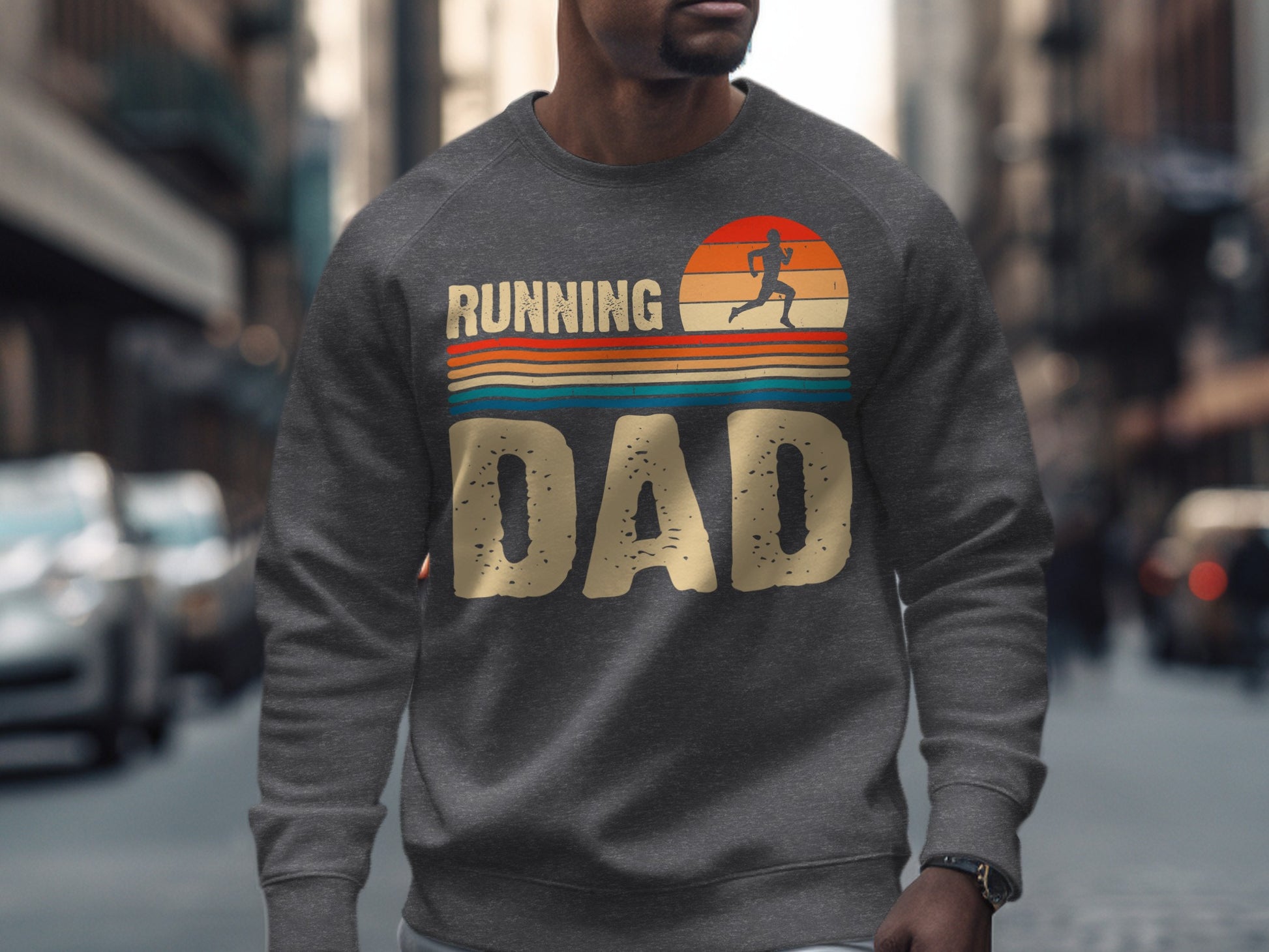 Gray sweatshirt with "Running Dad" text and silhouette of runner in sunset.