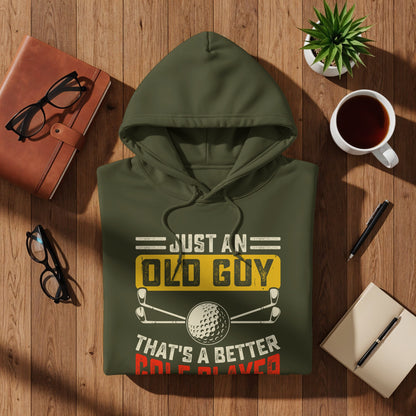 Olive green hoodie with text "JUST AN OLD GUY THAT'S A BETTER GOLF PLAYED".