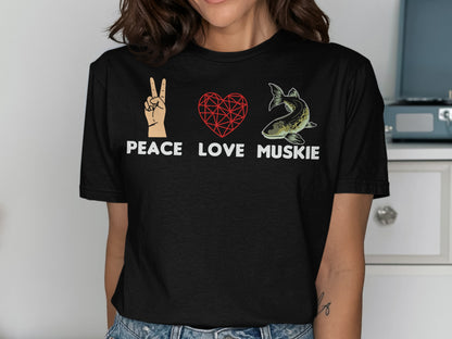 Black t-shirt with peace sign, heart, and muskie fish graphic and text.