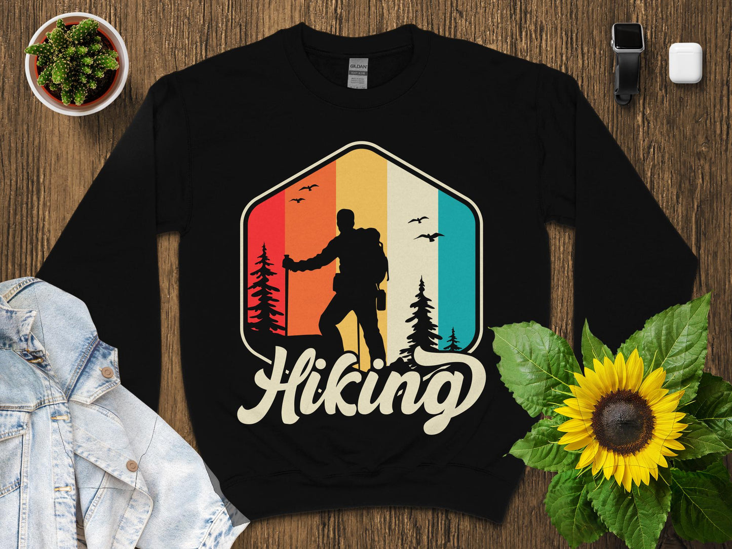 Black sweatshirt with a retro hiking graphic and "Hiking" text.
