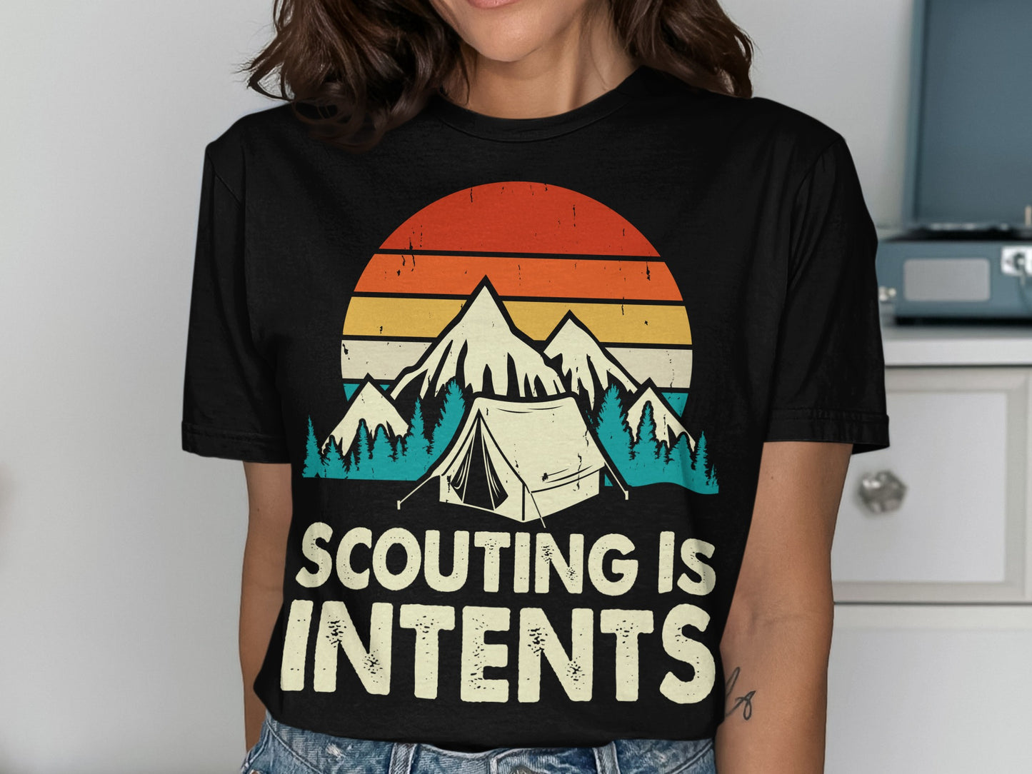 Black t-shirt with sunset, mountains, tent, and "Scouting is Intents" text.