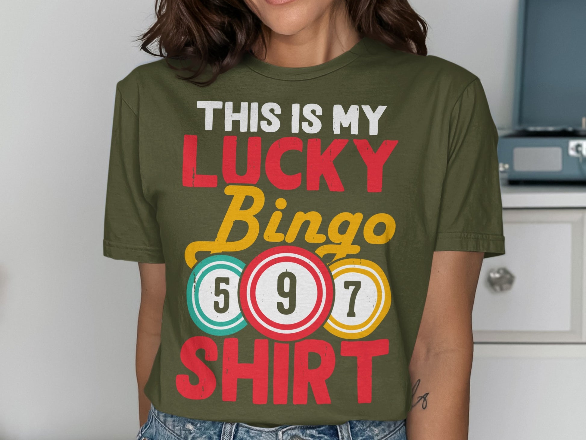 This is my lucky bingo shirt with colorful bingo balls and numbers.