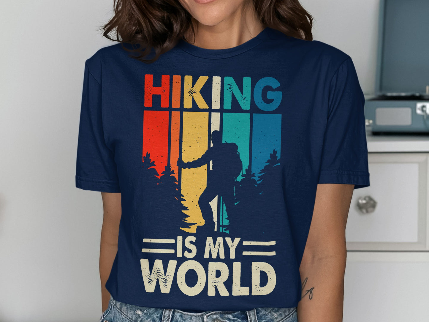 T-shirt with "Hiking is my world" text and a hiker silhouette.