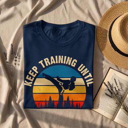 Navy t-shirt with "Keep Training Until" and a karate silhouette.