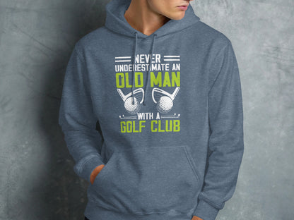 Grey hoodie with "Never underestimate an old man with a golf club" text and golf clubs.