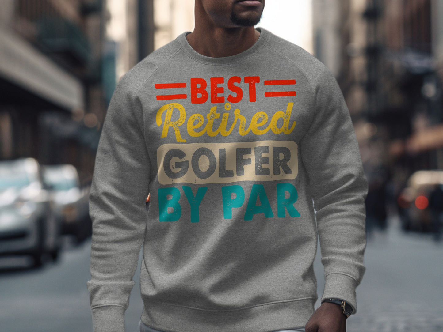 Grey sweatshirt with "Best Retired Golfer By Par" text graphic.