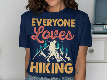 T-shirt with "EVERYONE Loves HIKING" and mountain graphic.