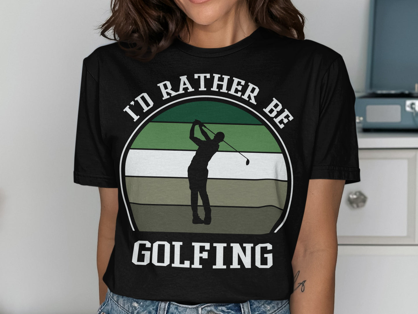I'd Rather Be Golfing text with silhouette of a golfer swinging.