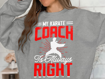 Grey sweatshirt with red text "My Karate Coach is Always Right" and a karate silhouette.