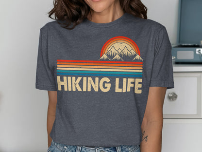 Dark grey t-shirt with "Hiking Life" text and colorful mountain sunset graphic.