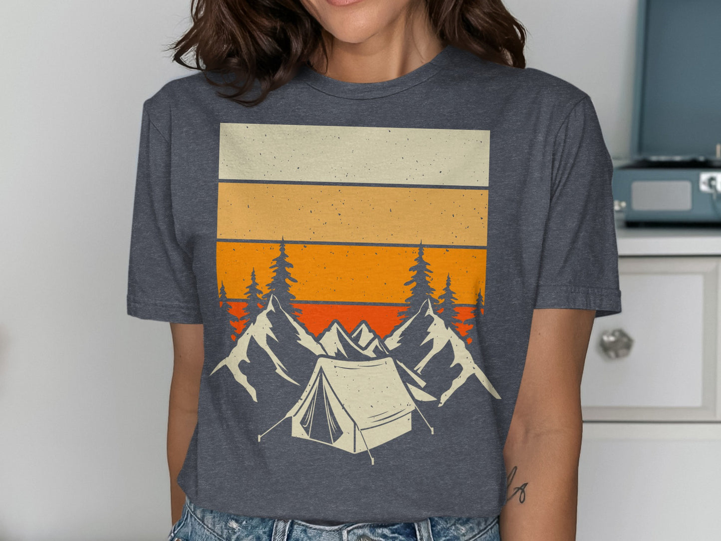 Dark grey t-shirt featuring a vintage mountain landscape design.