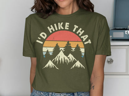 Olive green t-shirt with "I'd Hike That" and mountain landscape graphic.