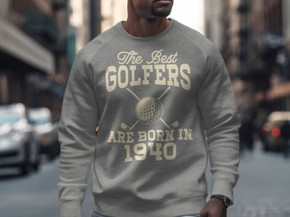 Grey sweatshirt with "The Best Golfers Are Born In 1940" text and golf clubs.
