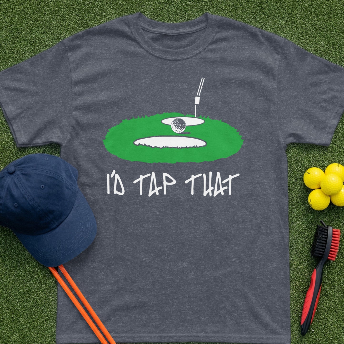 Golf t-shirt with a graphic of a golf ball in a sand trap and the text "I'D TAP THAT".