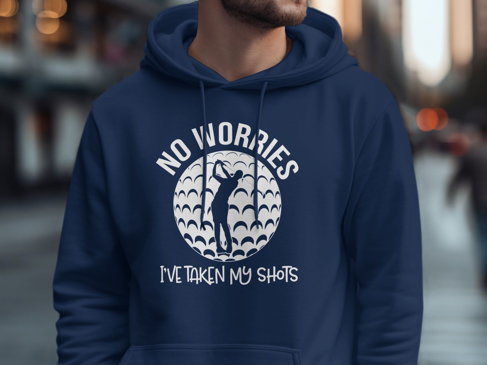 Navy hoodie with graphic of golfer and text "NO WORRIES I'VE TAKEN MY SHOTS".