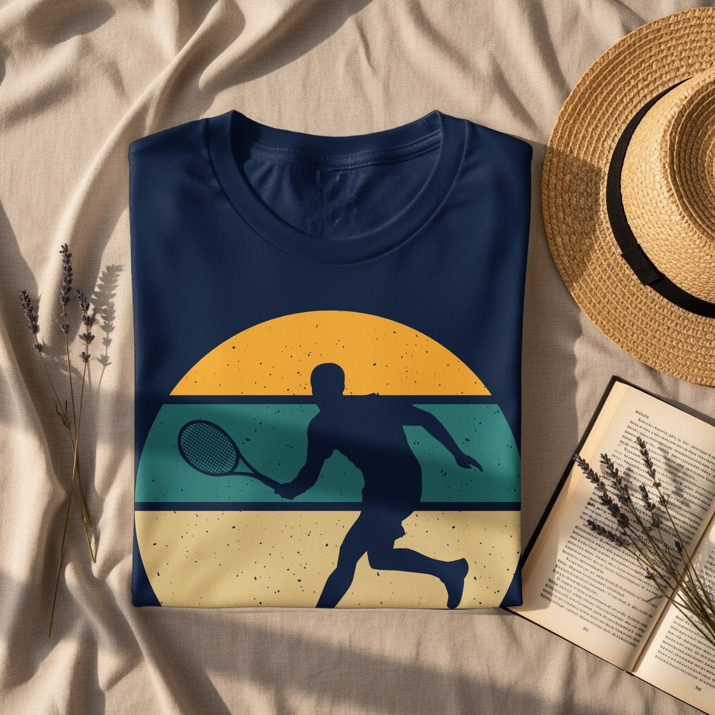 Navy t-shirt with vintage tennis player silhouette on sunset graphic.
