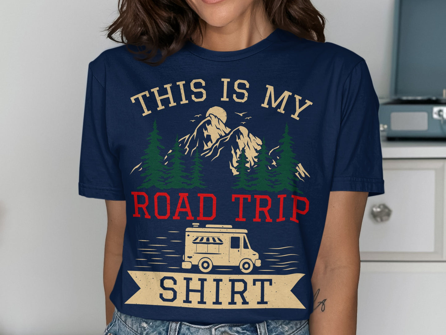 Dark blue t-shirt with "THIS IS MY ROAD TRIP SHIRT" and camper van graphic.
