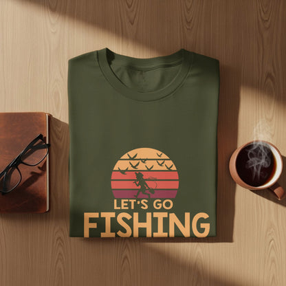 Green t-shirt with "LET'S GO FISHING" text and sunset bird graphic.