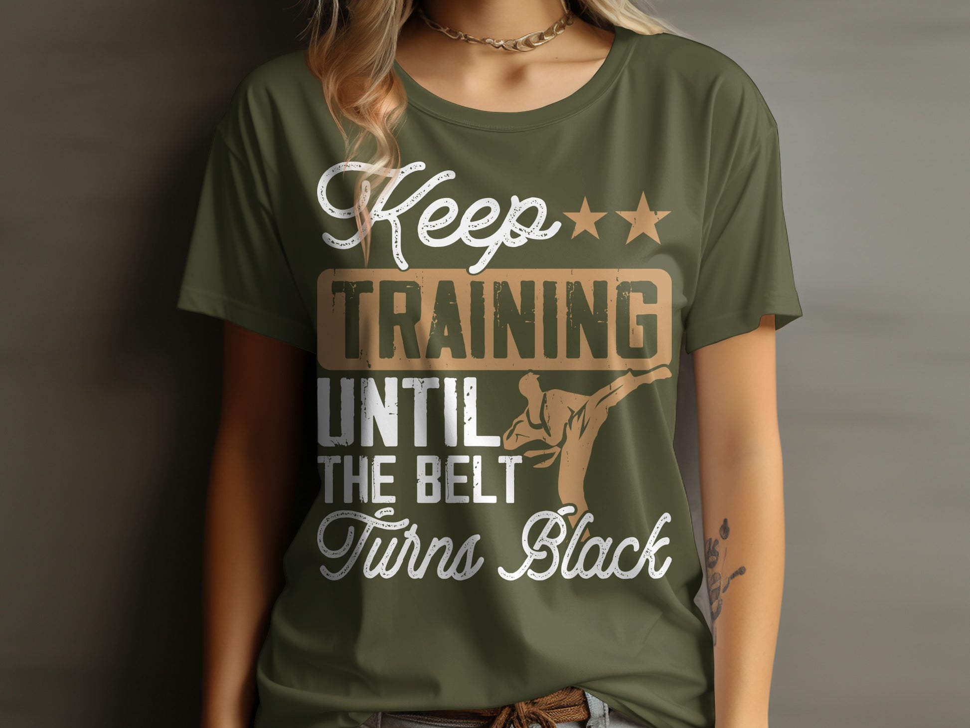Green t-shirt with "Keep training until the belt turns black" and karate silhouette.
