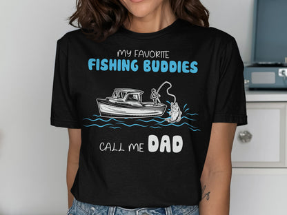 Black t-shirt with "My Favorite Fishing Buddies Call Me Dad" and fishing boat graphic.