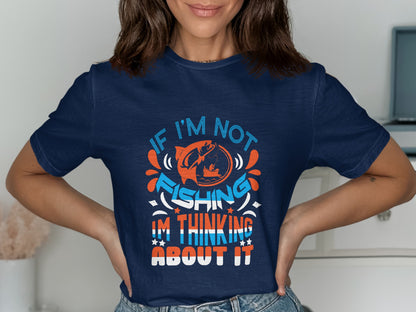 Navy t-shirt with text "IF I'M NOT FISHING I'M THINKING ABOUT IT" and graphic.