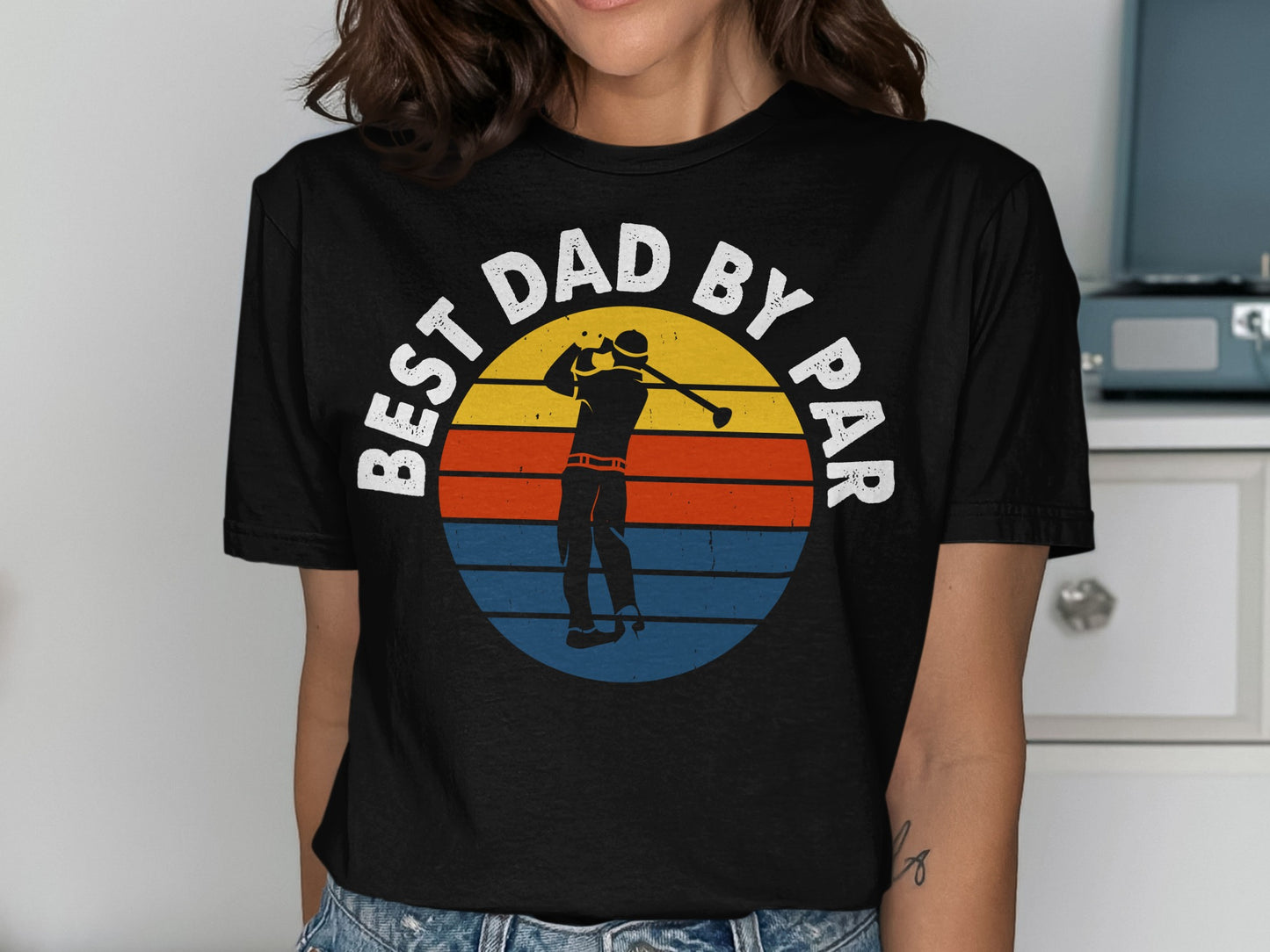 Black t-shirt with "BEST DAD BY PAR" text and a golfer graphic.