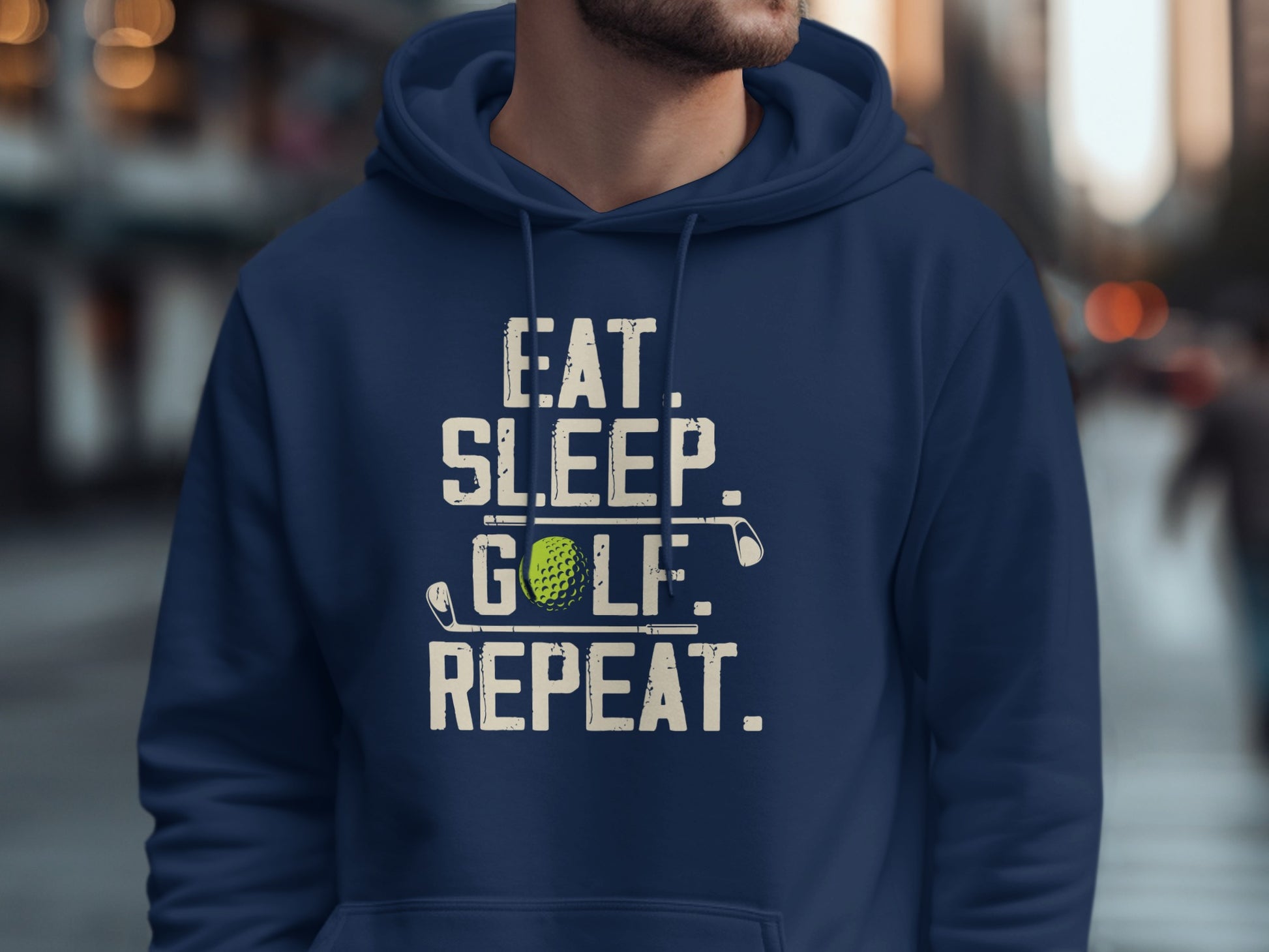 Navy hoodie with "EAT. SLEEP. GOLF. REPEAT." text and golf ball.