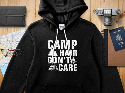 Black Gildan hoodie with "CAMP HAIR DON'T CARE" graphic.