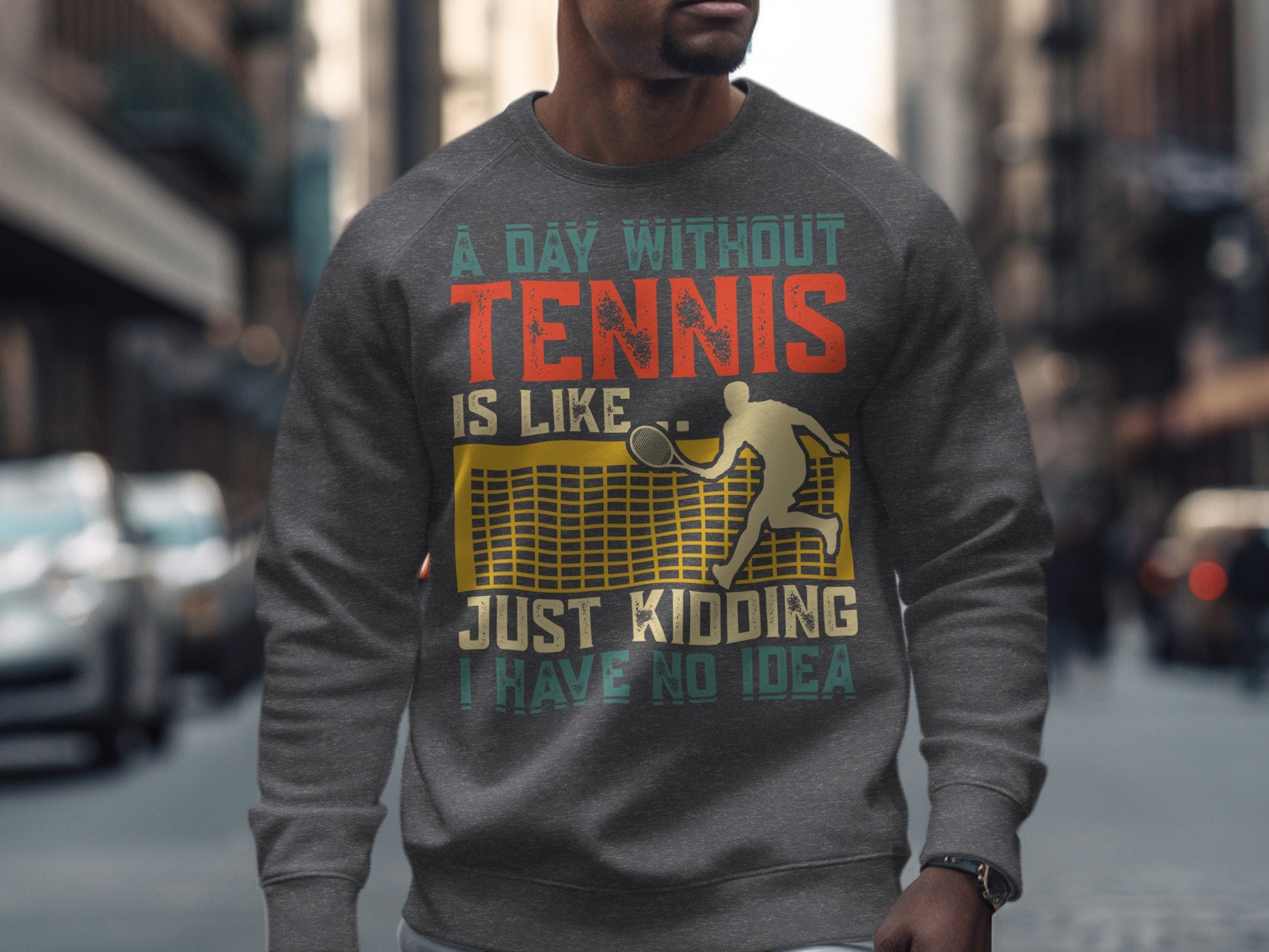 Gray sweatshirt with "A Day Without Tennis Is Like... Just Kidding I Have No Idea" text.