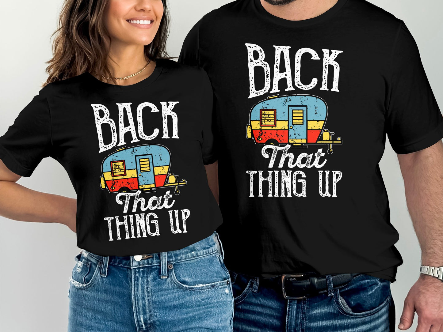Matching black t-shirts with "BACK THAT THING UP" and a camper graphic.