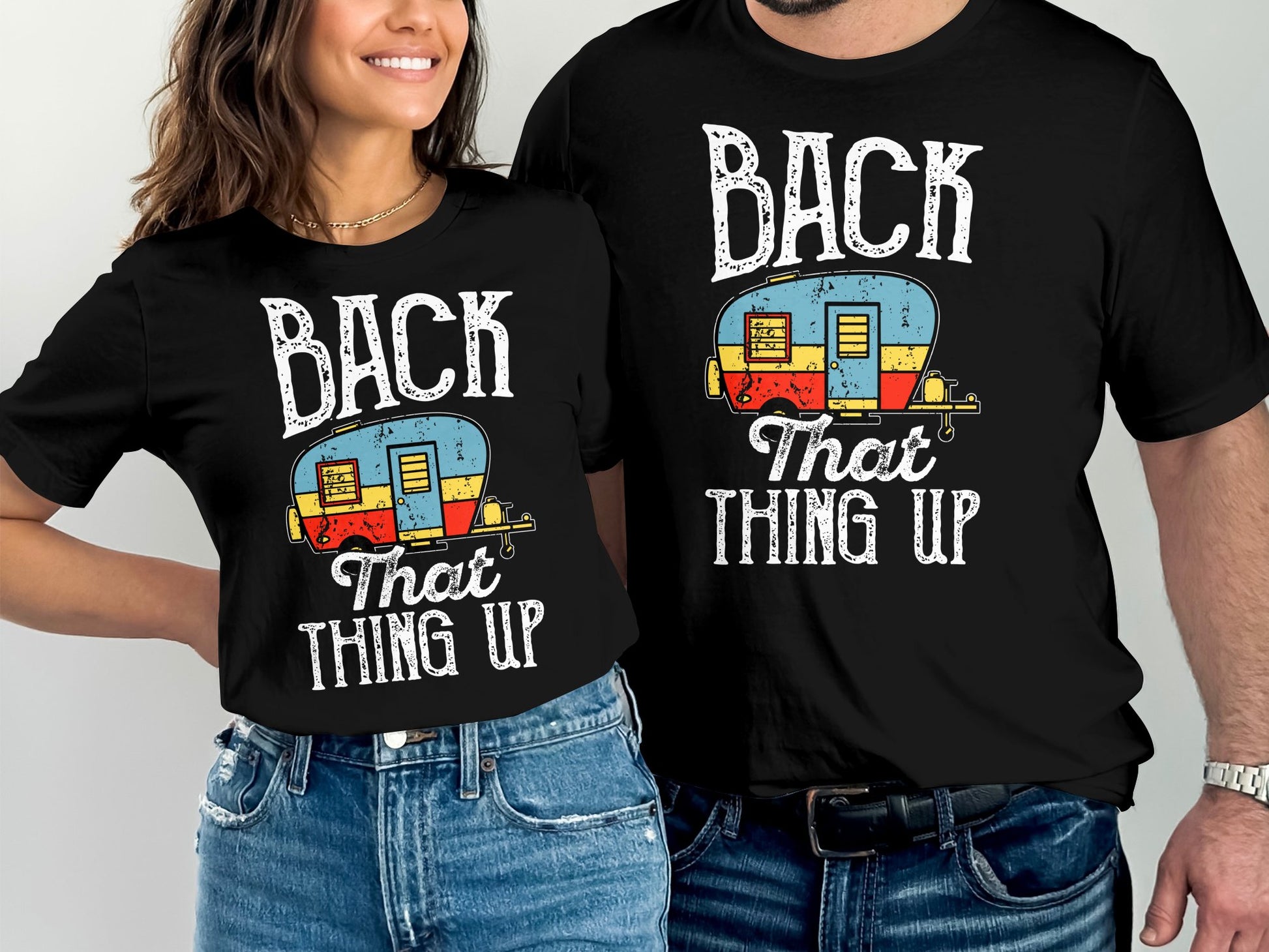 Matching black t-shirts with "BACK THAT THING UP" and a camper graphic.