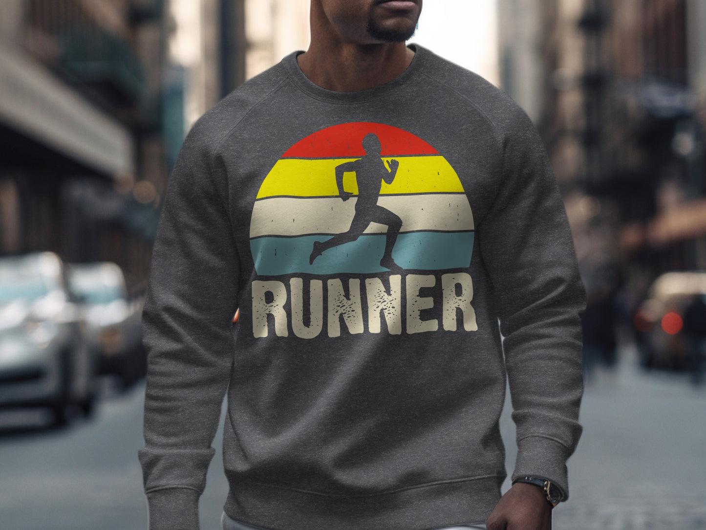 Grey sweatshirt with runner silhouette and "RUNNER" text within a sunset graphic.