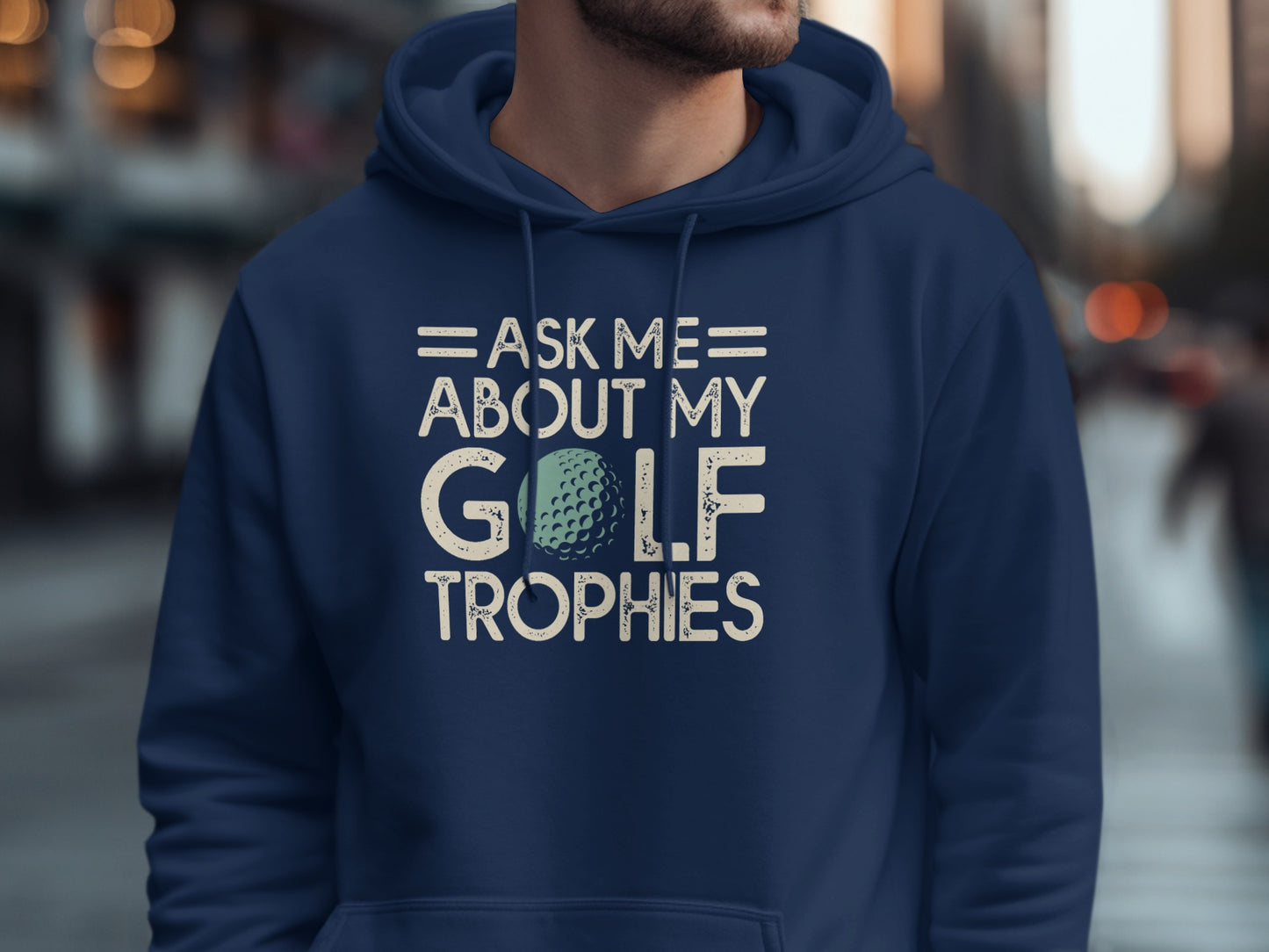 Navy hoodie with "Ask Me About My Golf Trophies" and a golf ball graphic.