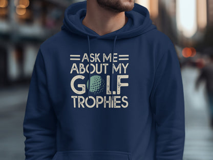 Navy hoodie with "Ask Me About My Golf Trophies" and a golf ball graphic.