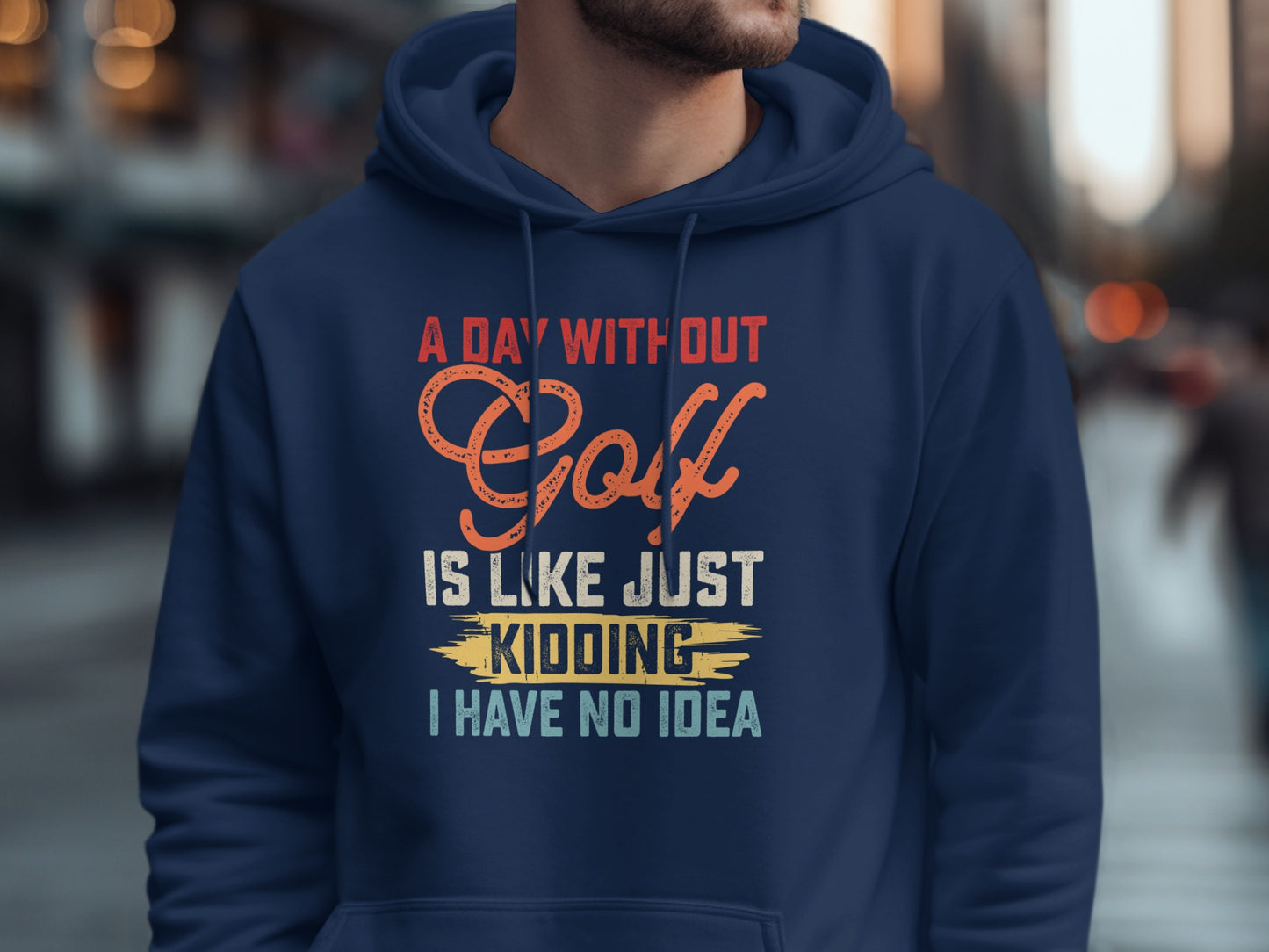 Navy hoodie with "A day without golf is like just kidding I have no idea" text.