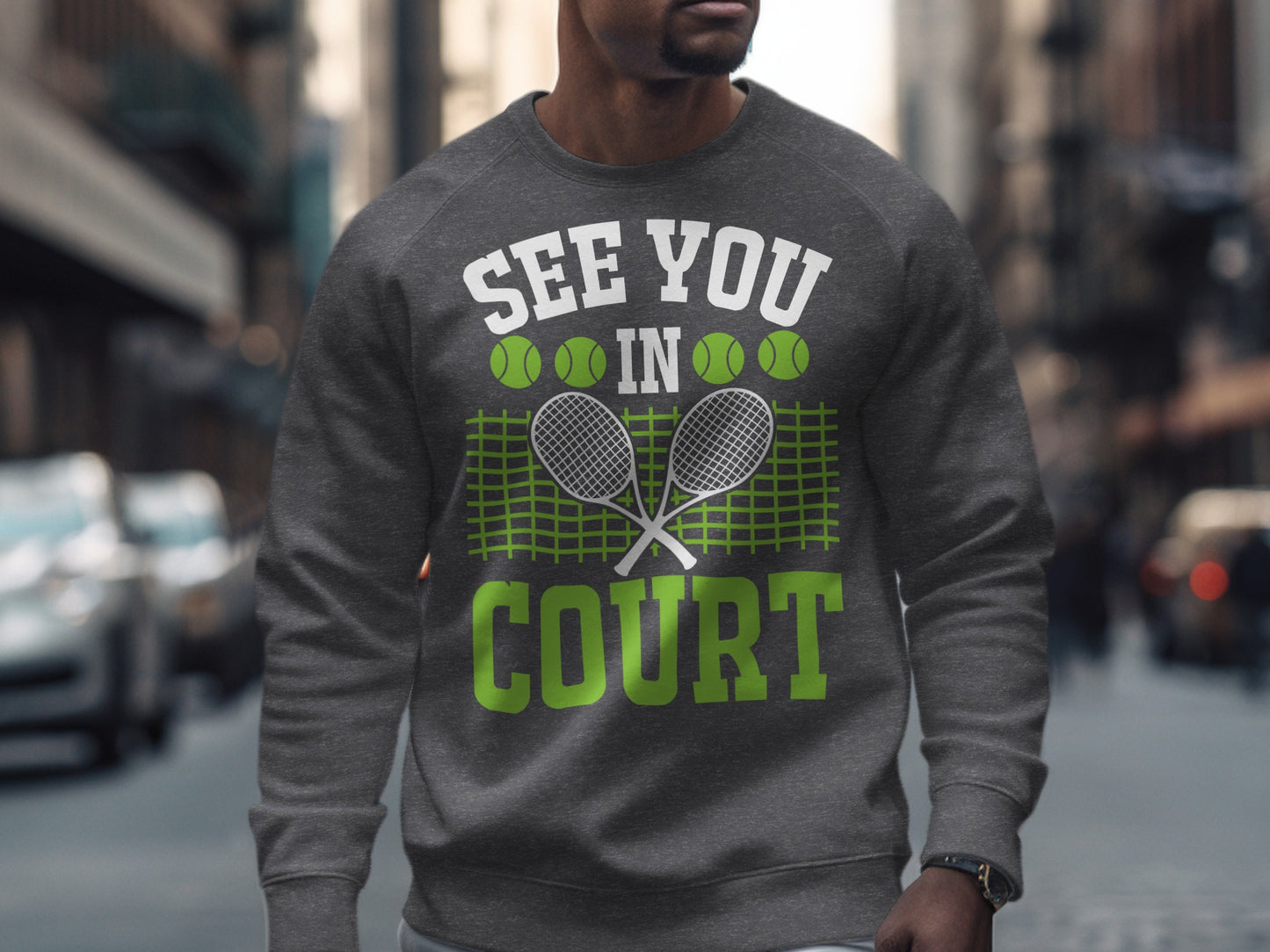 Gray sweatshirt with "SEE YOU COURT" and tennis rackets.