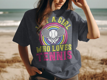 Dark gray t-shirt with "Just a girl who loves tennis" and colorful racket graphic.