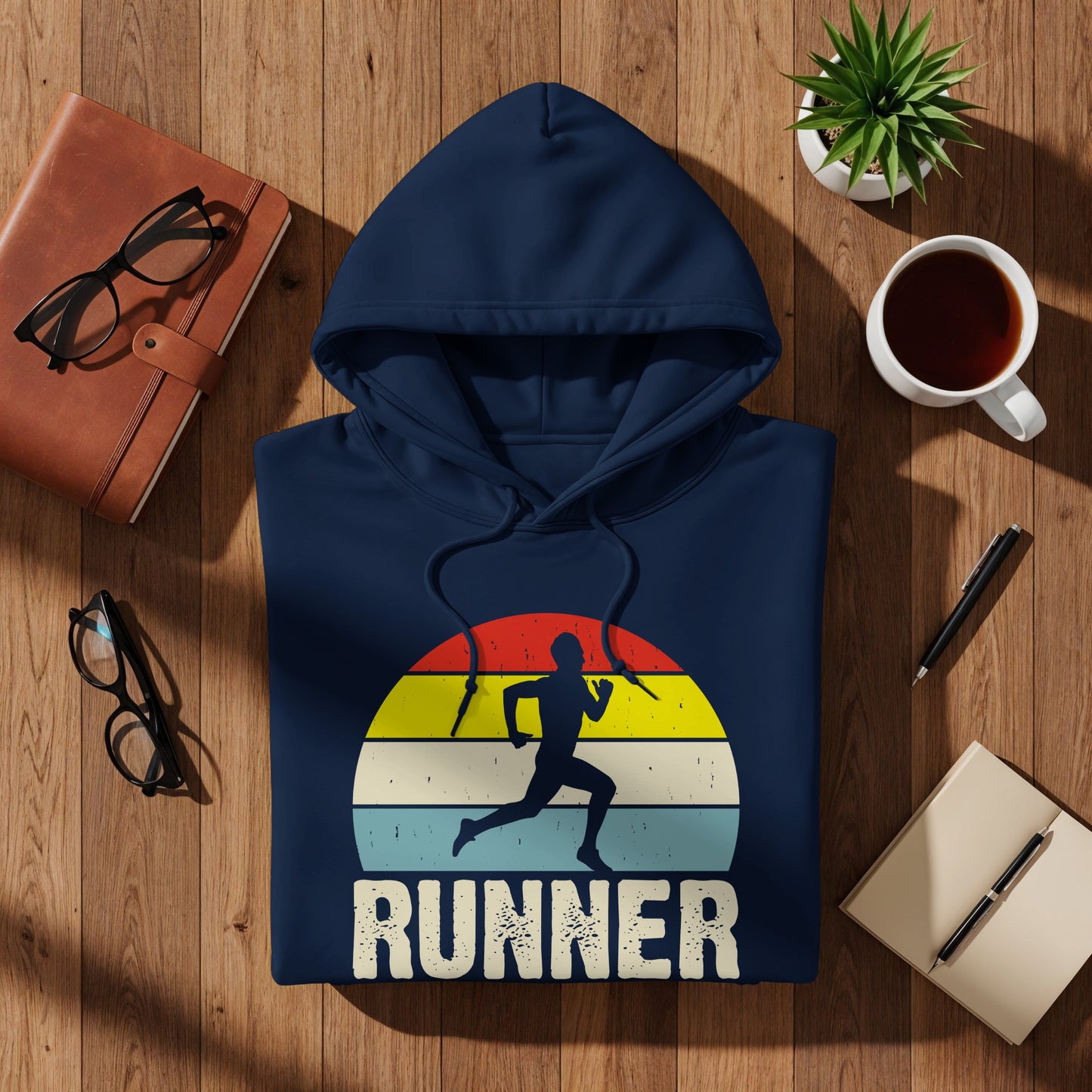 Navy hoodie with a runner silhouette against a striped sunset, text "RUNNER".